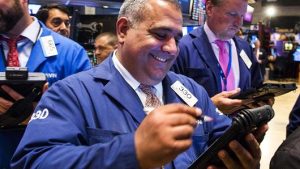 Dow surges more than 350 points as US-China trade war is placed ‘on hold’