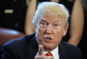 The Latest: Footnote in Trump report lists Cohen payment