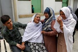 Suicide bomber kills 13, including women, outside Afghan ministry