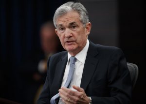 Fed raises key rate and sees possible acceleration in hikes