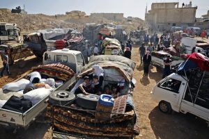 Hundreds of Syrian refugees in Lebanon cross back into Syria