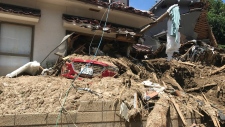 Many out of power, water in flood-hit Japan; over 150 dead