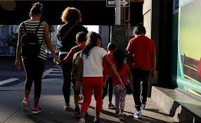 U.S. says all eligible young migrant children reunited with parents