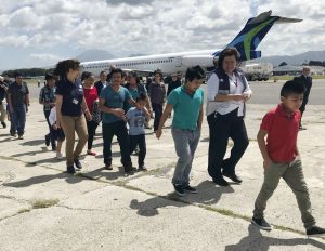 The Latest: Judge halts deportations of reunited families after ACLU filed paperwork