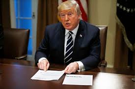 Trump, seeking to calm political storm over Putin summit, says he misspoke