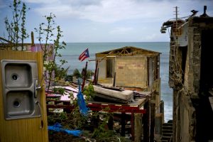 The Latest: Governor hikes Puerto Rico storm Maria toll to 2,975