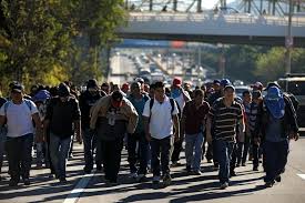 Migrants depart from El Salvador as new U.S.-bound caravan forms