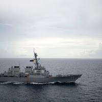 US angers China after sailing two warships close to disputed South China Sea islands