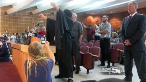 ‘Hail Satan’ opening prayer at Alaska government meeting prompts walkouts, protest