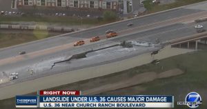 Coloradans watch with shock a huge crack that became a gaping sinkhole, swallowing parts of U.S. 36 between Denver and Boulder, Colorado