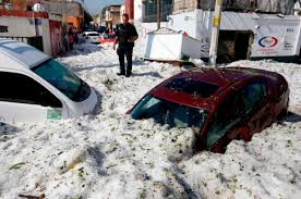 Mexican city of Guadalajara hit with freak hail storm leaving cars trapped in ice