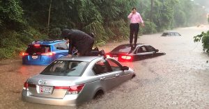 Flooded roadways, stranded vehicles as heavy rains batter the DC region