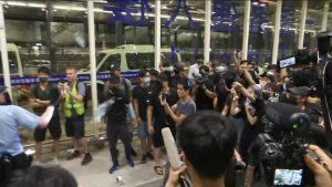 Live updates as police withdraw from Hong Kong’s airport after attempting to disperse protesters who have grounded flights