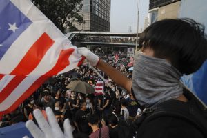 Marchers ask Trump to ‘liberate’ Hong Kong, as clashes erupt