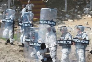 VIDEOS: Migrant Caravan Crosses into Mexico, Clashes with National Guard