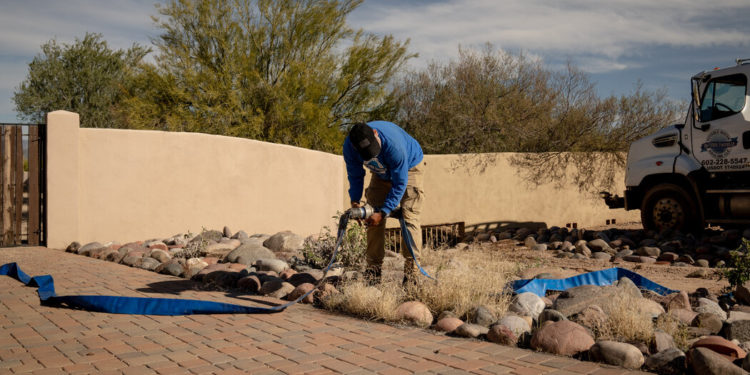 Skipped Showers, Paper Plates: An Arizona Suburb’s Water Is Cut Off