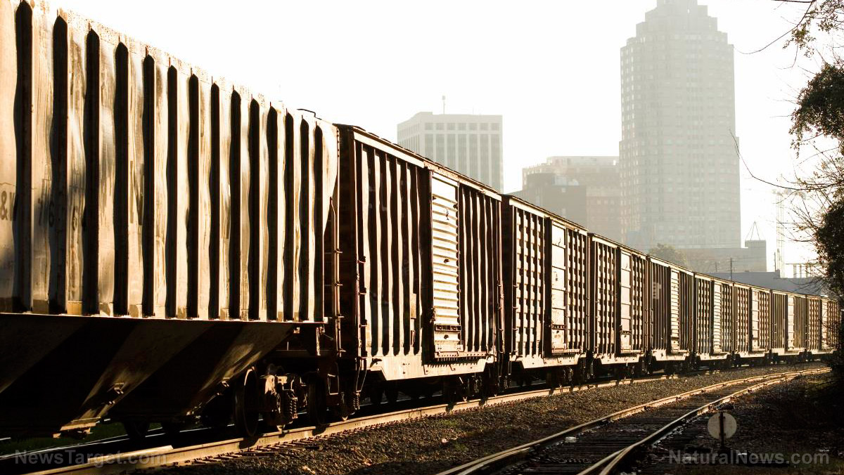 Train carrying paint and lithium ion batteries derails in Wisconsin, sending two cars into Mississippi River