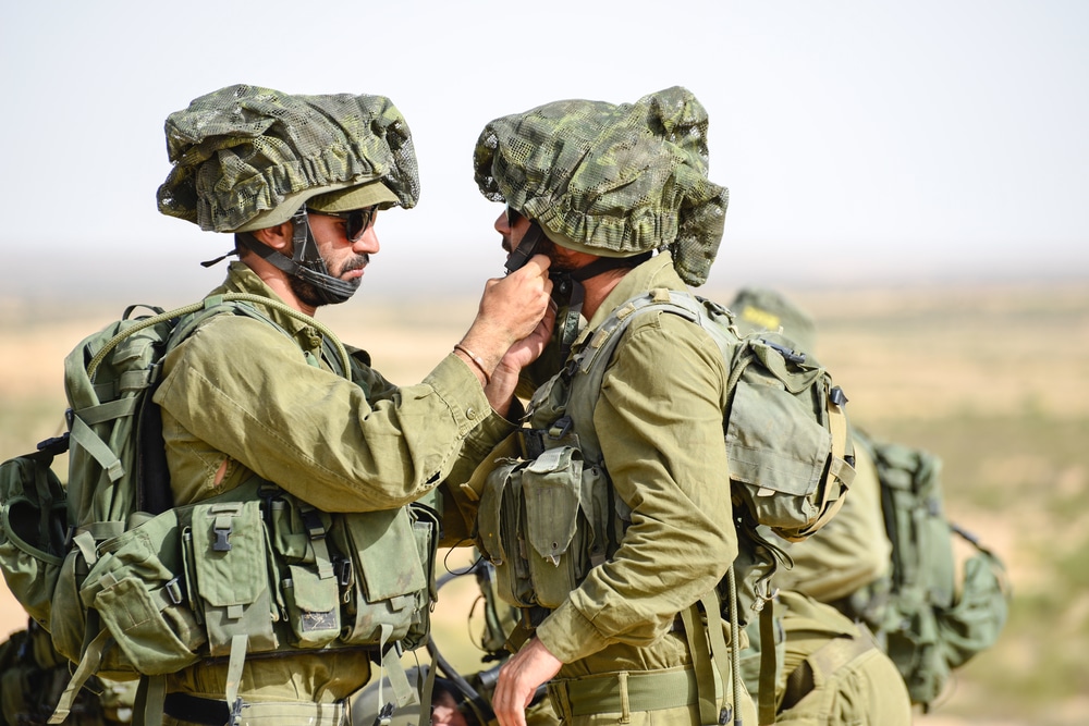 Israel drafts 300,000 reservists as war escalates