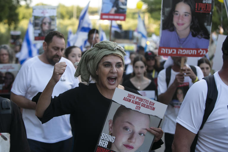 Hamas agrees to tentative deal to free dozens of hostages, pending Israel’s approval