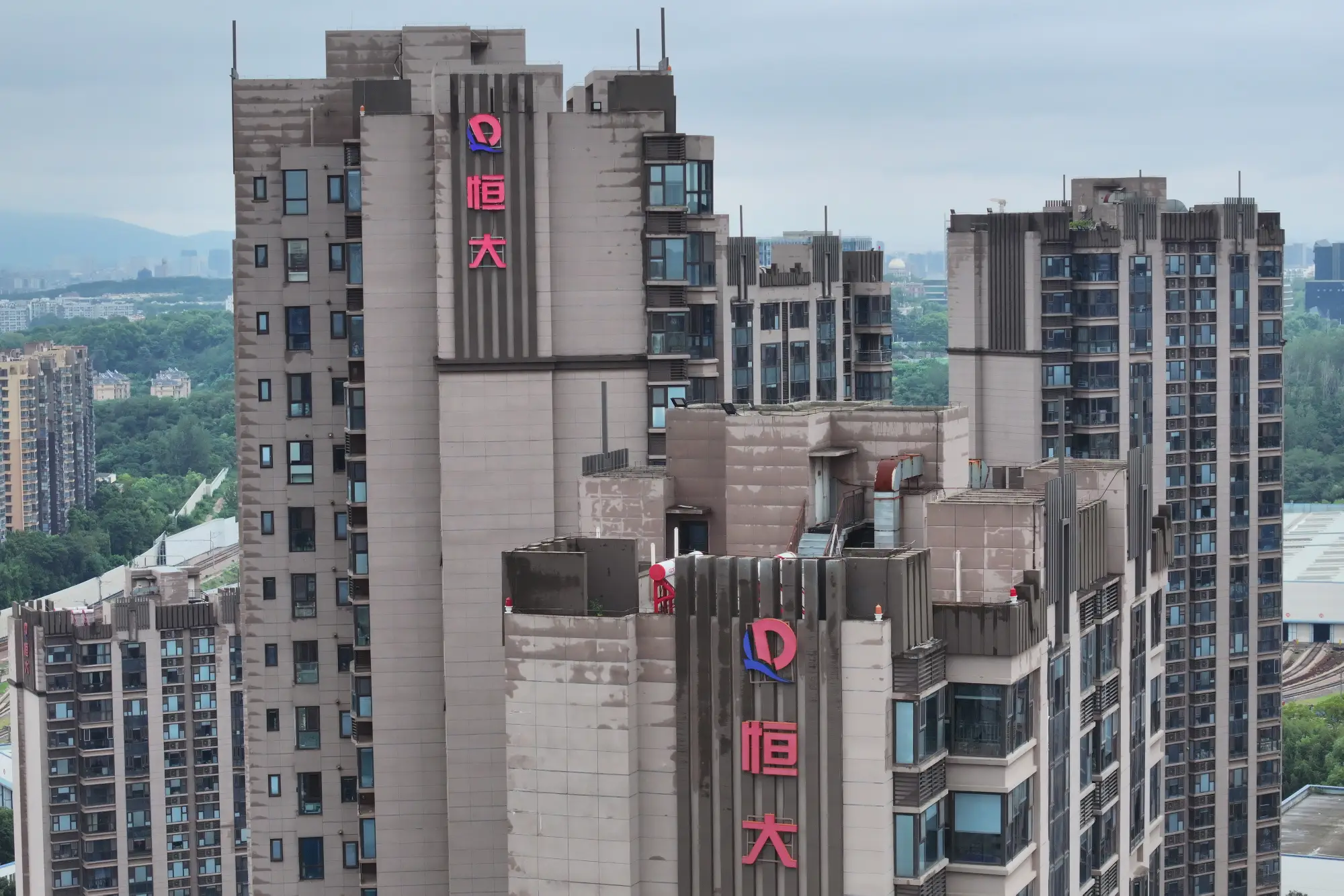 Evergrande, the massive Chinese real estate developer with $300 billion in debt, is ordered to liquidate by a Hong Kong court