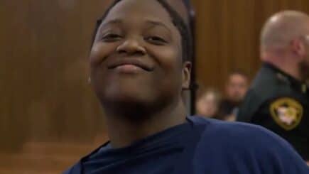 DEMONIC: Monster who murdered 3-year-old smirks at the camera as charges are read