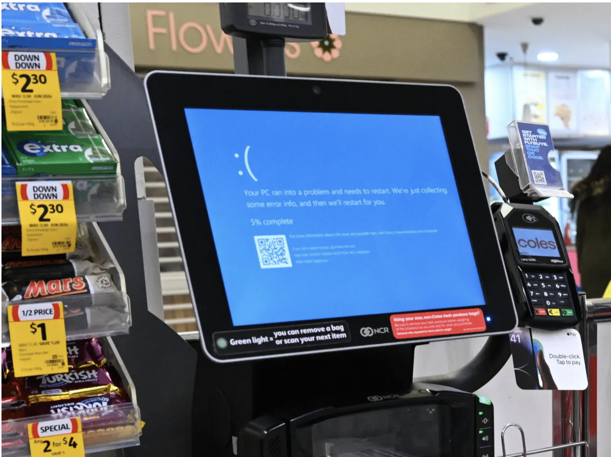 Written boarding passes, ‘blue screens of death’ & checkout chaos…world reacts to being in ‘dark ages’ after tech outage