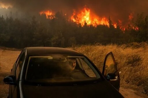 Greece’s marble mountain burns in wildfires
