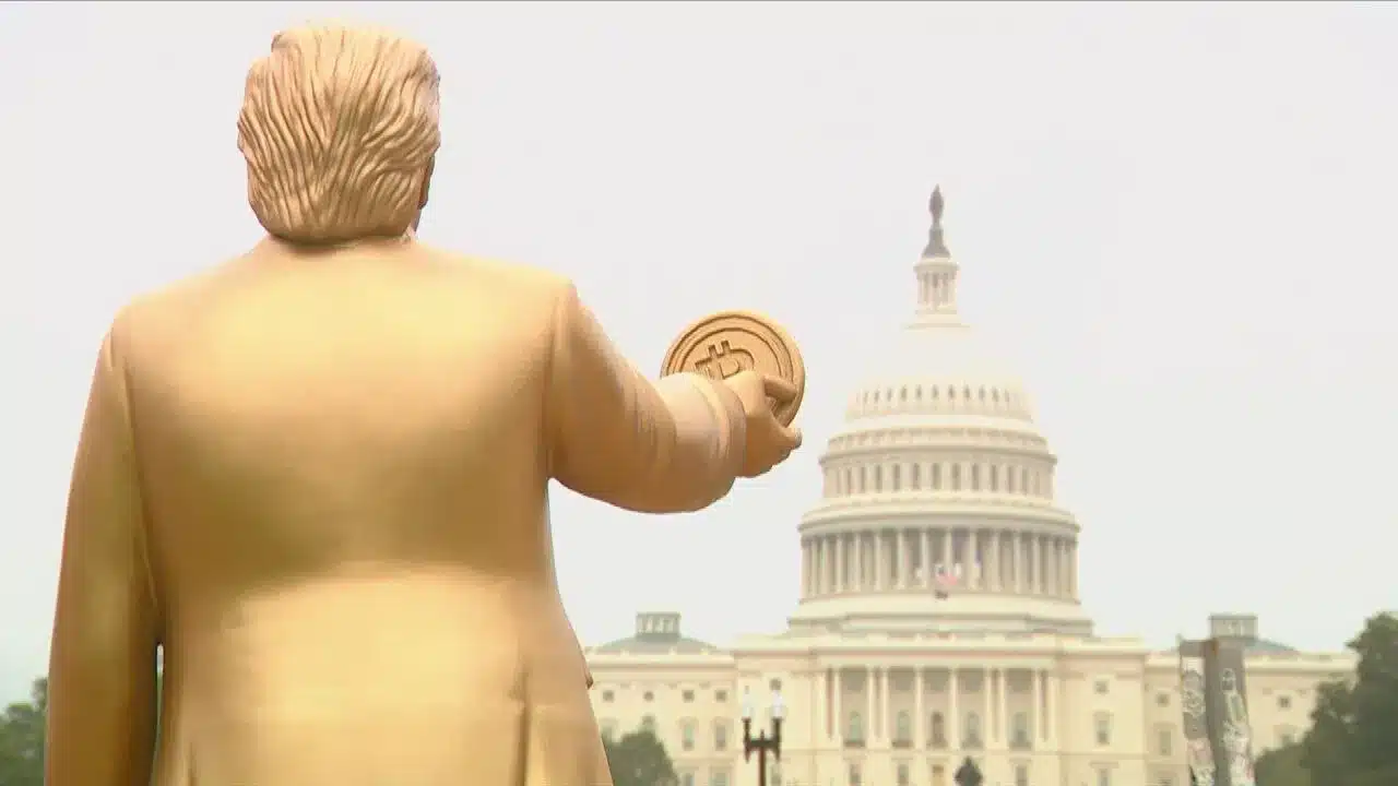 Giant golden Trump statue holding Bitcoin displayed outside US Capitol to mark Fed rate decision